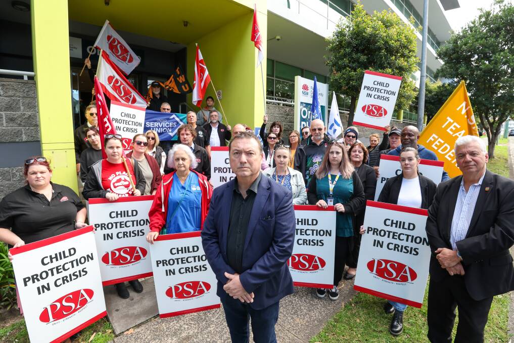 Public Service Association general secretary Stewart Little, centre, with child protection caseworkers and South Coast Labour Council secretary Arthur Rorris, right, in Coniston. Picture by Adam McLean